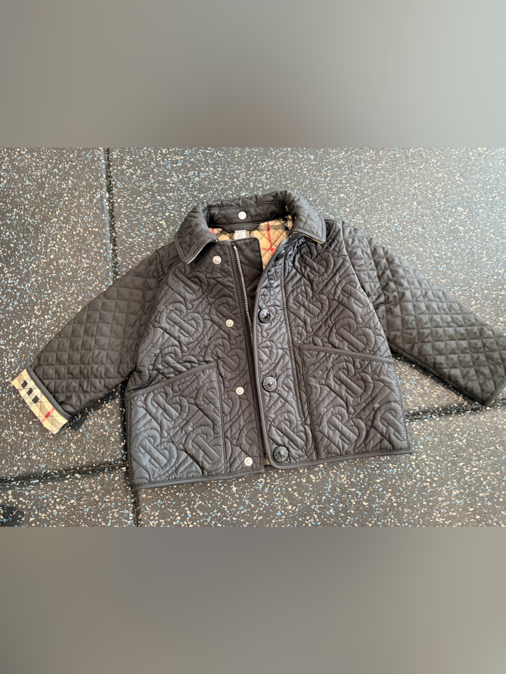 Burberry Black Quilted Puffer Jacket with Signature Trim and Detachable Hoodie